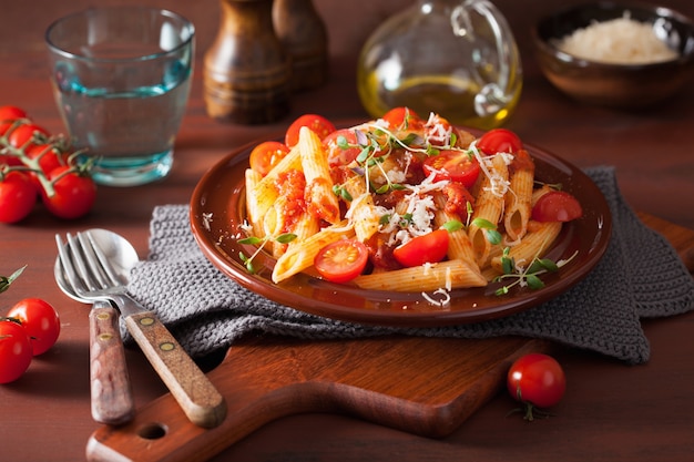 Penne pasta with tomatoes and parmesan