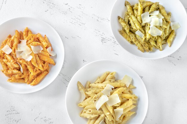 Penne pasta with various pesto sauces