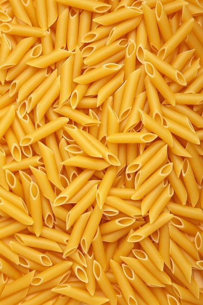 Penne Rigate pasta achtergrond Verticale foto