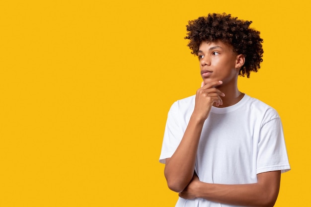 Pensive black teenager think idea confused student
