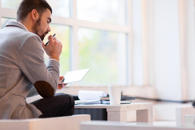 Pensive Businessman Wrapped up in Work