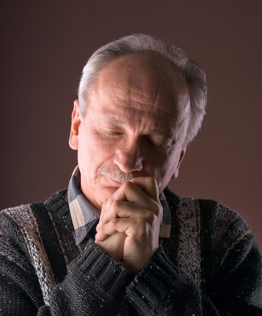 Pensive elderly man