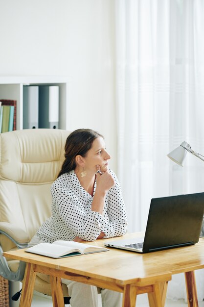 Pensive female entreprneur