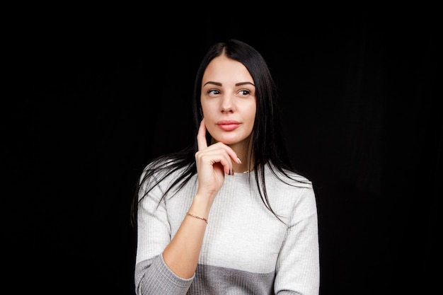 pensive girl in a light sweater