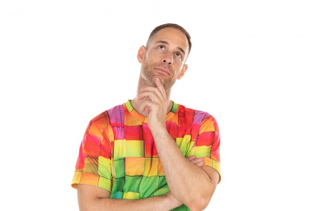 Pensive guy with colored tshirt