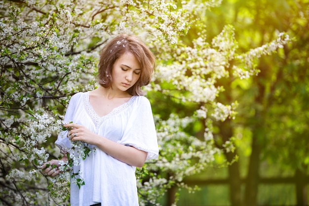 Pensive lovely girl of European appearance