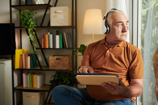 Pensive Man Watching Music Videos