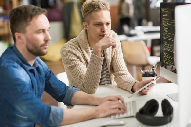 Pensive programmers working of software engineering project