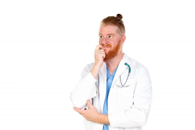 Pensive redhead doctor