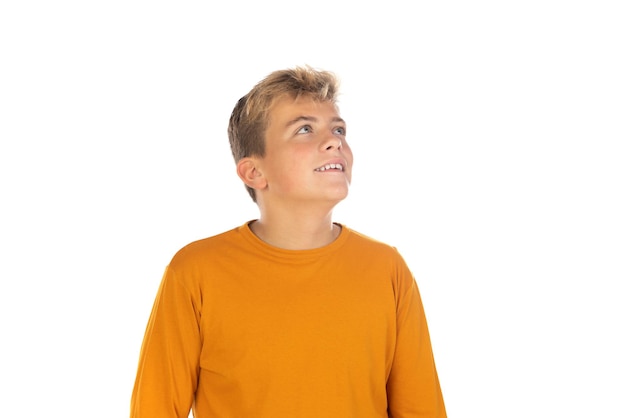 Pensive teenager in orange tshirt