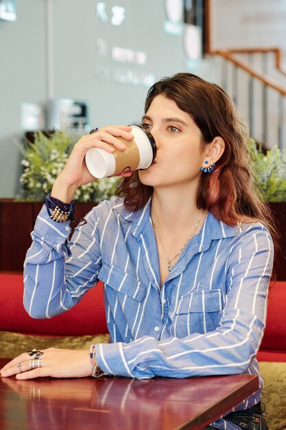 Pensive Woman Drinking Coffee