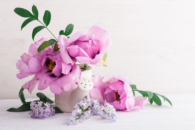 Peonies and lilac flowers