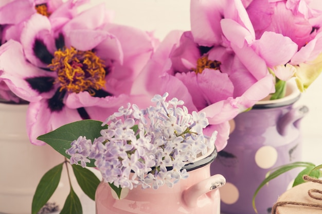 Peonies and lilac flowers