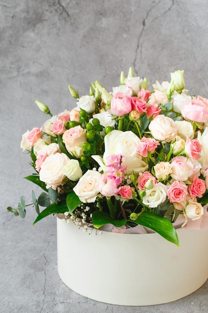 peonies, roses and eustomas in the papper gift box