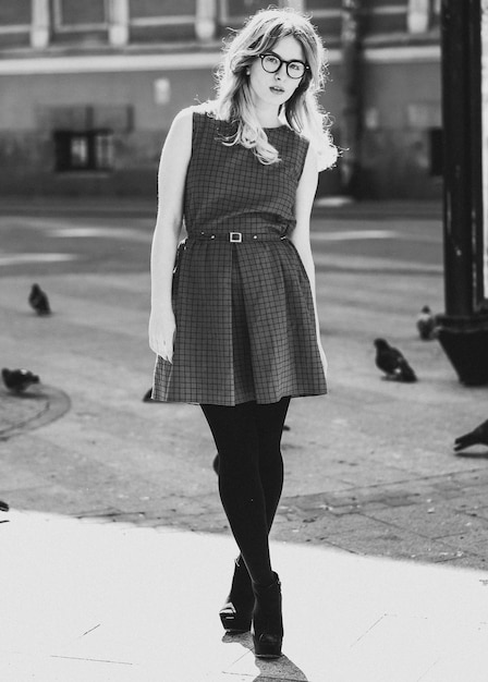 People abd fashion concept young woman in the city summer time black and white picture