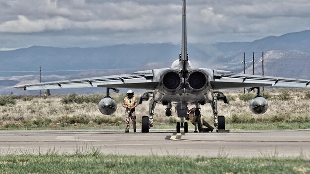 People on airport runway