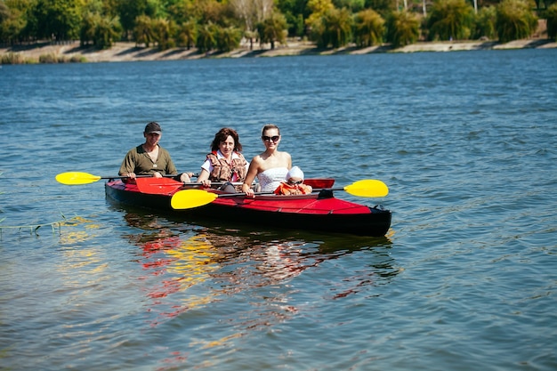 People of all ages in a kayak