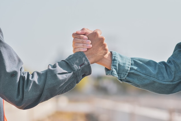 Photo people are shake hand relationship  community partner