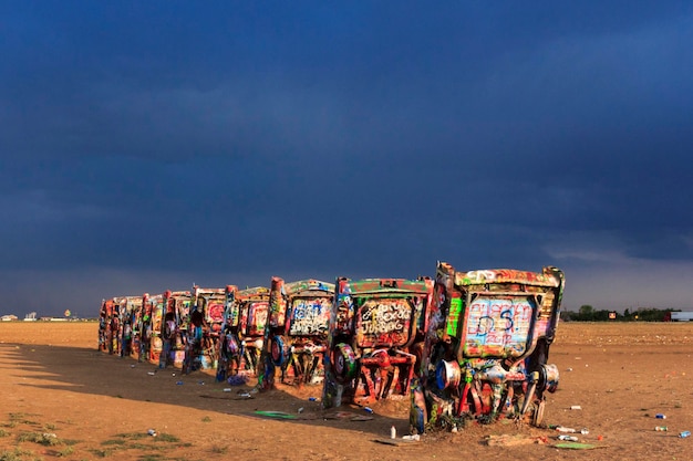 People at beach against sky