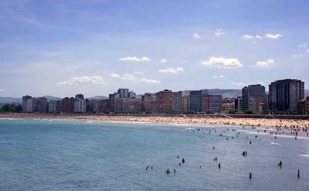 People in the beach of Gijon