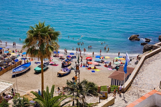 People on the beach in Nice, France. Nice is a popular tourist destination in France.