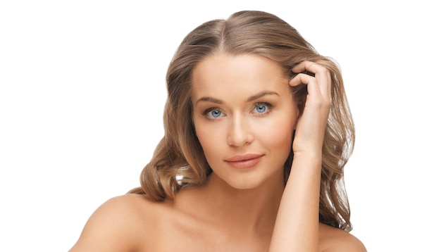 people, beauty and hair care concept - beautiful woman face with long blond hair