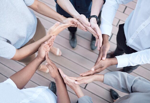 Photo people business and hands in circle for teamwork in day for solidarity support and diversity in workplace team building huddle and global collaboration for international company trust and above