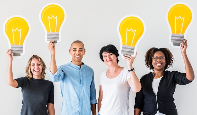 People carrying light bulb icons