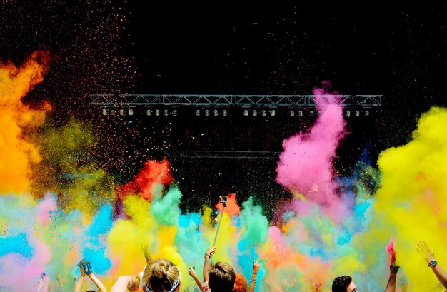 People celebrating colorful holi festival