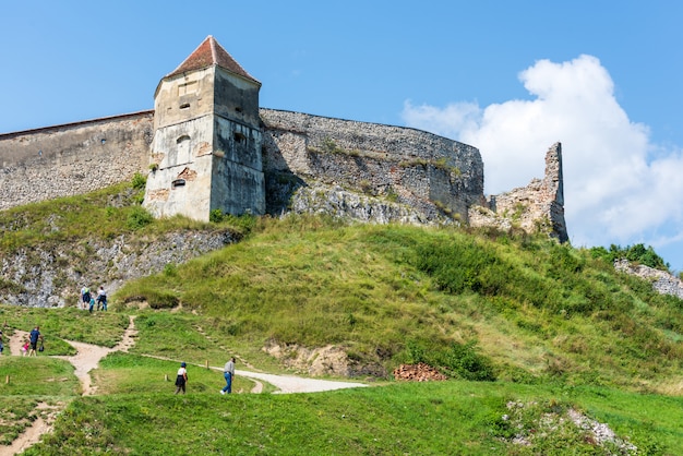 People climb the path to the Rasnov Citadel