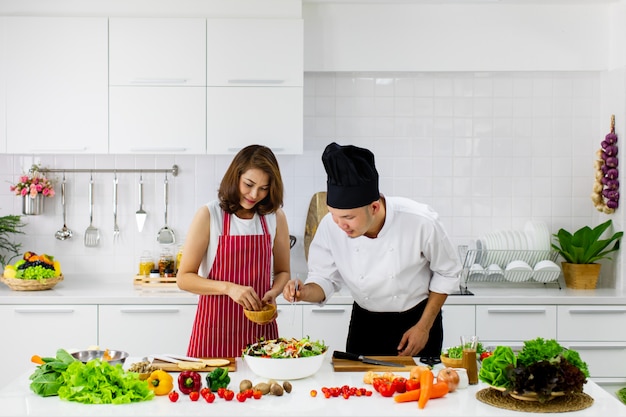 People at cooking class in modern kitchen.