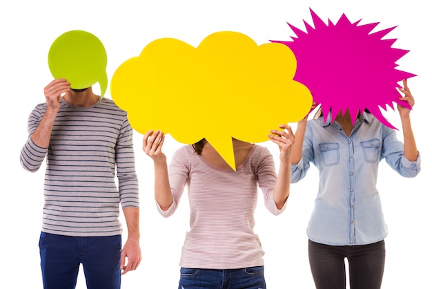 People covered their faces with blank speech bubbles