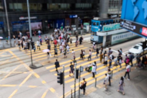 People cross the road with bokeh