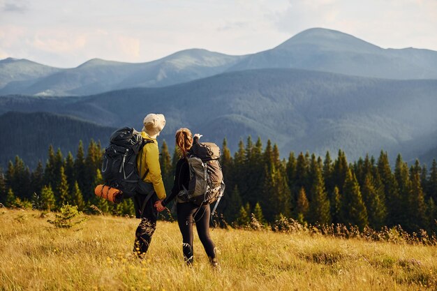 People discovering new lands Majestic Carpathian Mountains Beautiful landscape of untouched nature