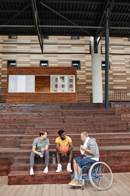 People discussing match on the stadium