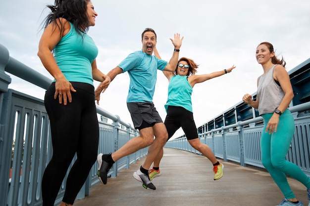 Photo people doing sport together full shot