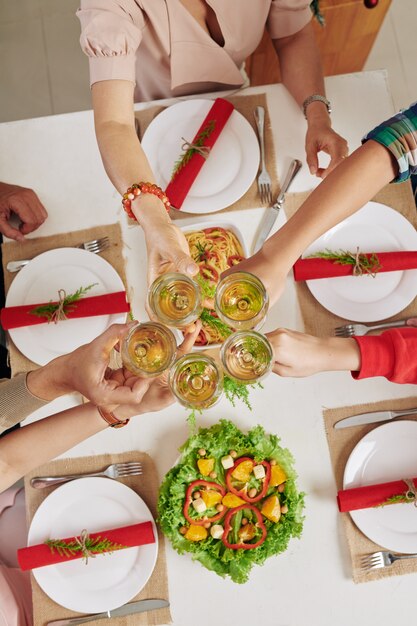 People drinking champagne at dinner