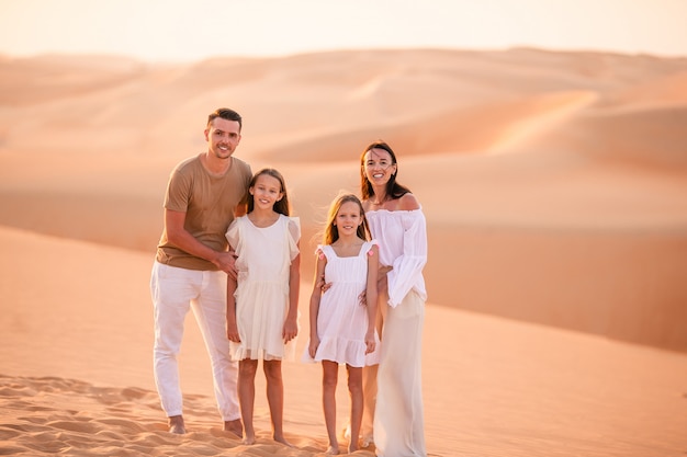 People among dunes in Rub al-Khali desert in United Arab Emirates