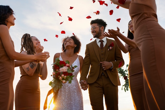 Photo people enjoying burnt orange wedding