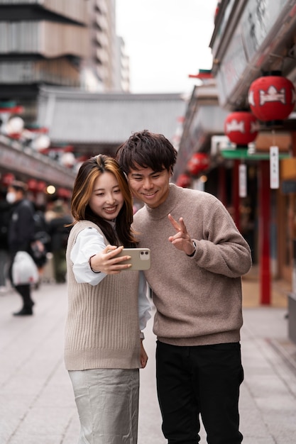 People enjoying japanese street food