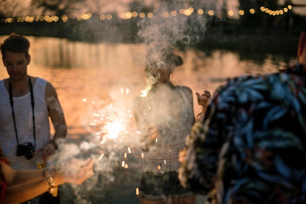 People Enjoying Sparkler in Festival Event