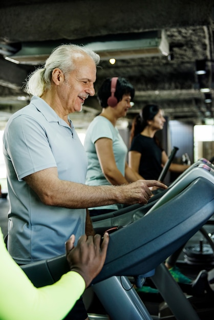 People exercising at fitness gym