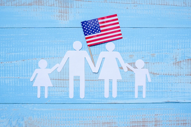 People or Family paper shape with  flag of the United States of America 