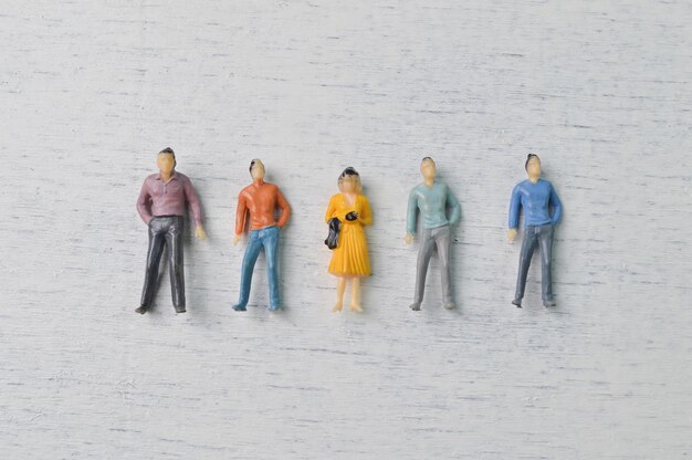 People figures standing together isolated on a white background