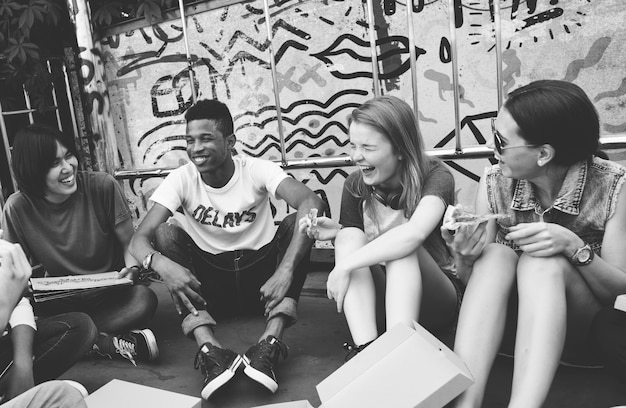 people friendship togetherness eating pizza youth culture concept