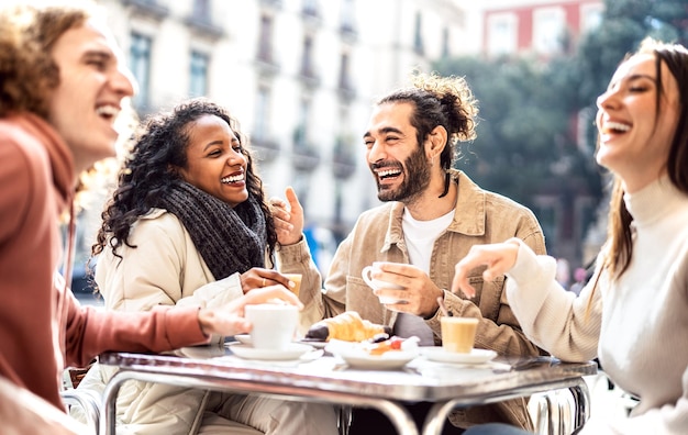 People group drinking cappuccino at coffee bar patio