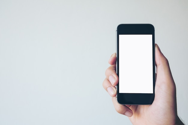 People hand holding mockup smart phone