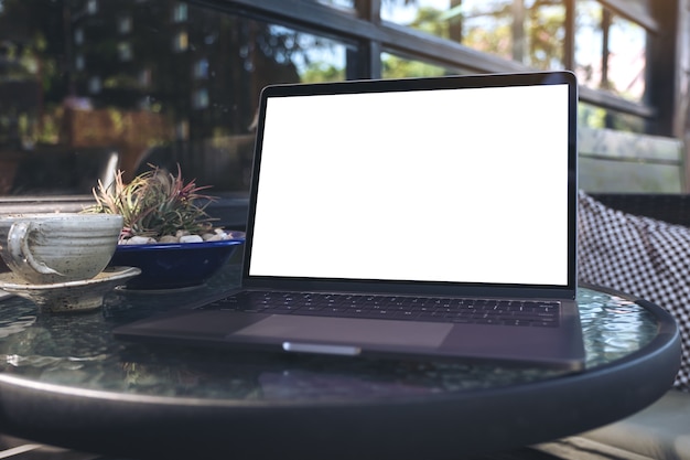 People hand using mockup laptop computer