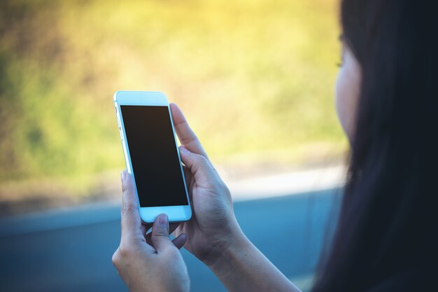 People hand using mockup smart phone