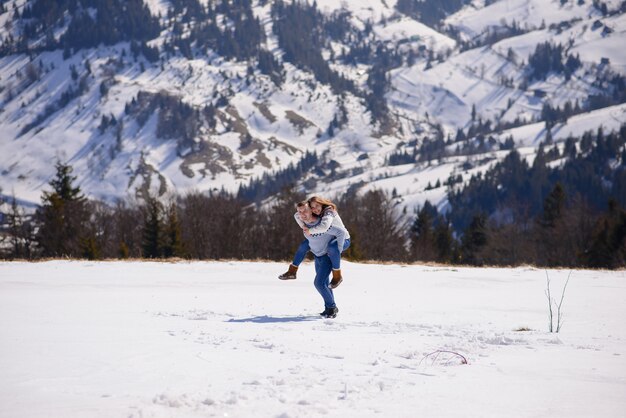 People having fun and running in mountains